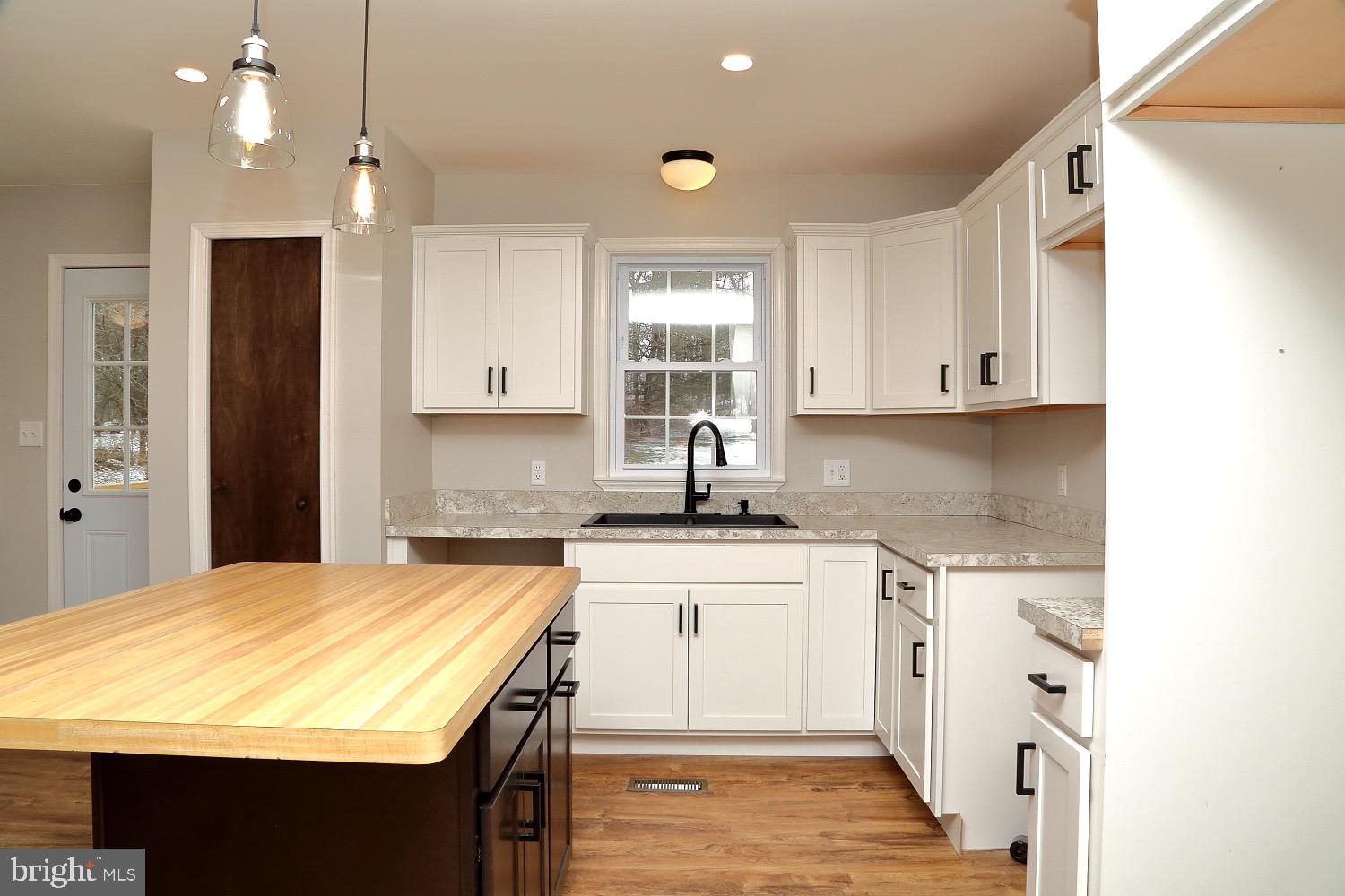 195 Kirks Mill Road Nottingham, PA 19362 - Photo 3 of 22 Custom pendants & recessed lighting keep it bright