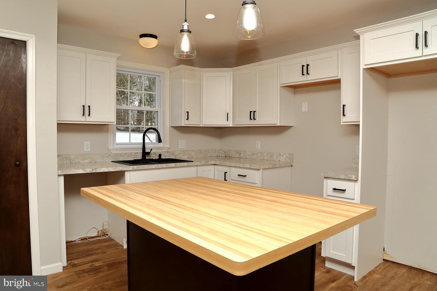 195 Kirks Mill Road Nottingham, PA 19362 - Photo 8 of 22 Large island & new cabinets...stove and DW ordered