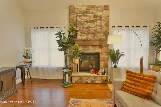 a view of hall way with furniture