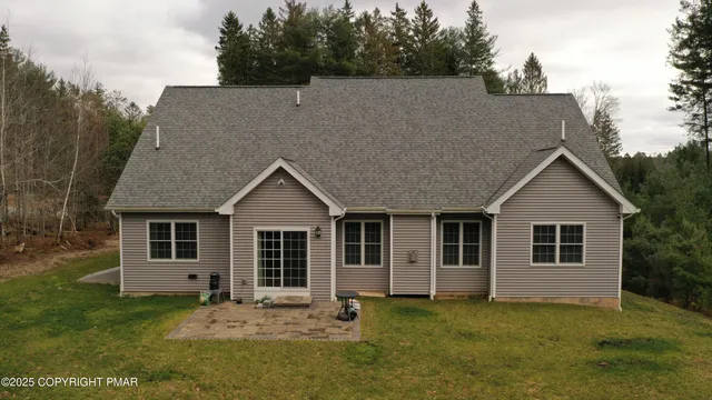 a house view with a garden space