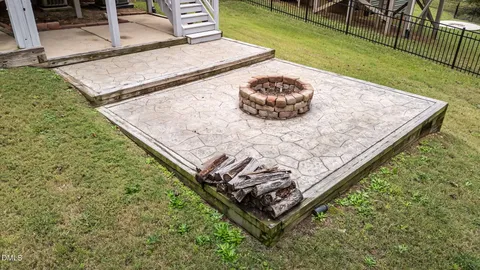 a view of a backyard with a tub
