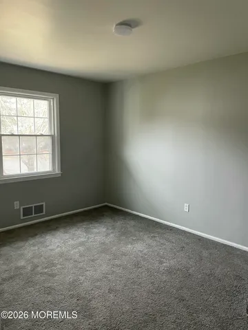 an empty room with a workbench