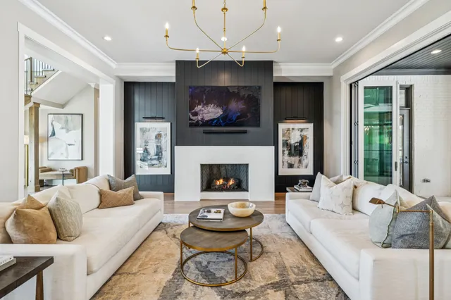 a large kitchen with stainless steel appliances granite countertop a stove and a sink