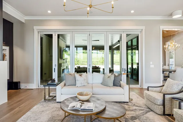 a kitchen with a stove a sink and a wooden cabinets