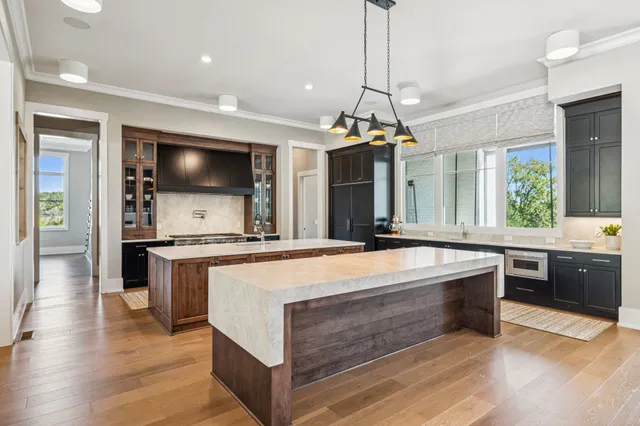 a living room with large windows