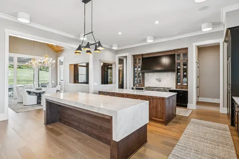 a view of a kitchen with a sink and dishwasher