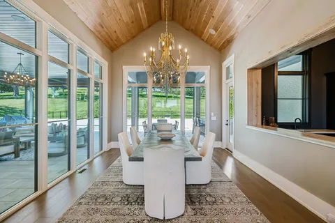 a white bath tub sitting in a en suite bathroom