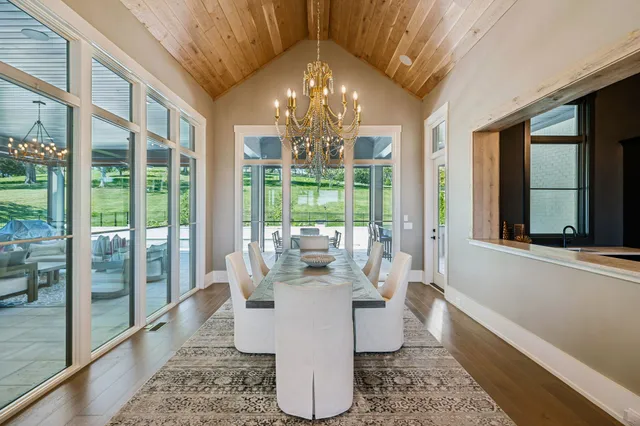 a white bath tub sitting in a en suite bathroom