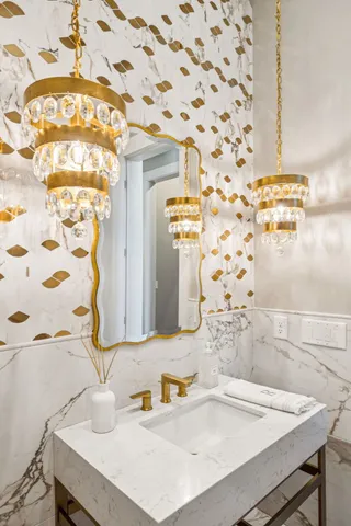 a bedroom with a bed a couch and a window