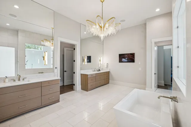 a bedroom with a bed couch and window