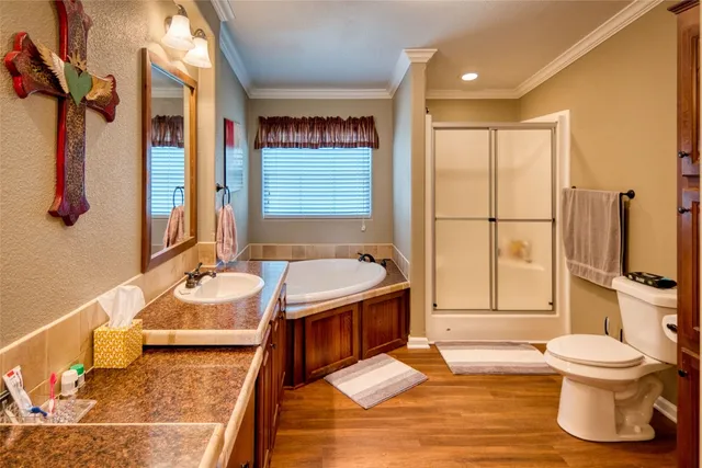 a bedroom with bed and a window