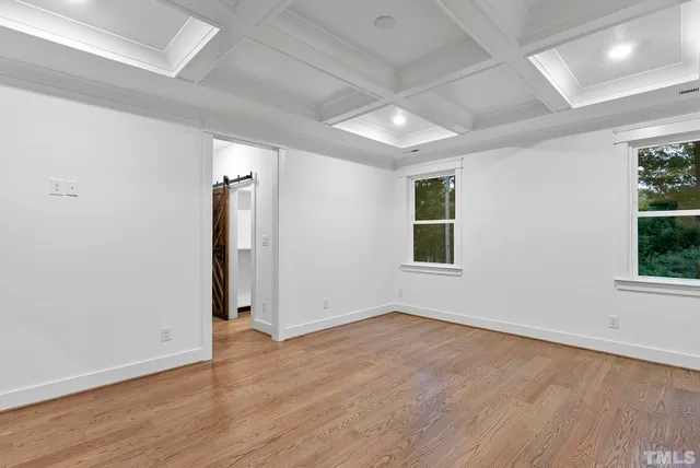 a front view of house with yard and outdoor seating