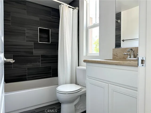 a view of a bedroom from a hallway