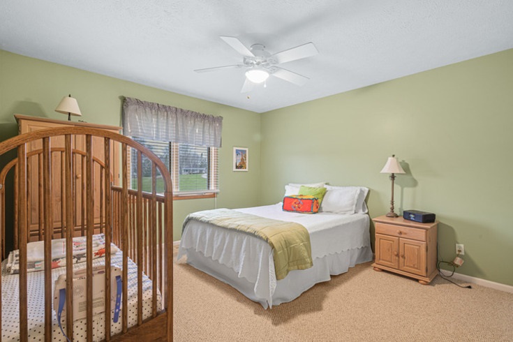 834 Breckenboro Road Lake Summerset, IL 61019 - Photo 16 of 39 a bedroom with a bed and a window