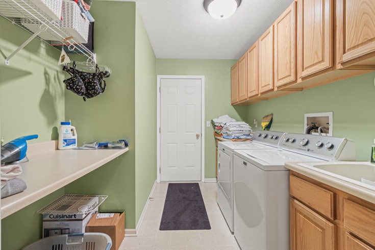 834 Breckenboro Road Lake Summerset, IL 61019 - Photo 17 of 39 a room with storage and utility