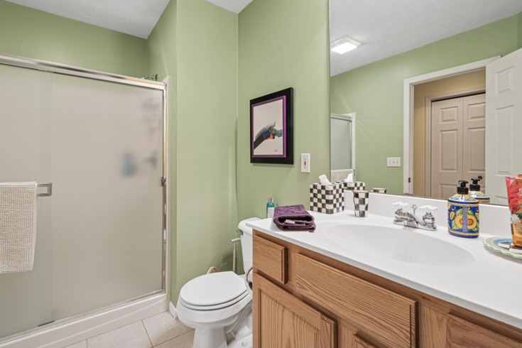 834 Breckenboro Road Lake Summerset, IL 61019 - Photo 18 of 39 a bathroom with a sink mirror toilet and vanity