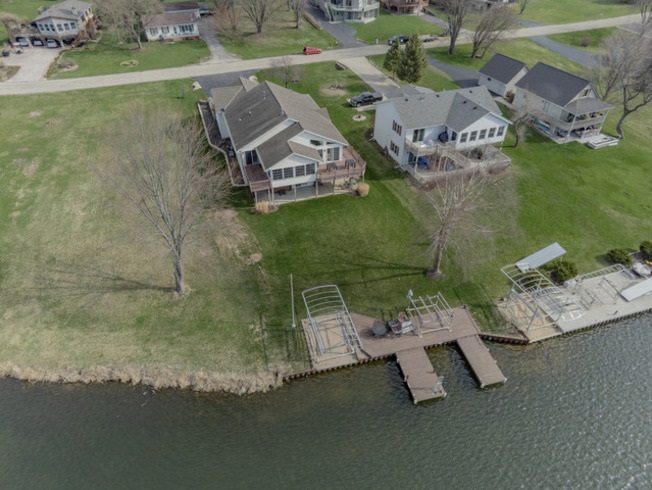 834 Breckenboro Road Lake Summerset, IL 61019 - Photo 2 of 39 an aerial view of a house with a yard and lake view