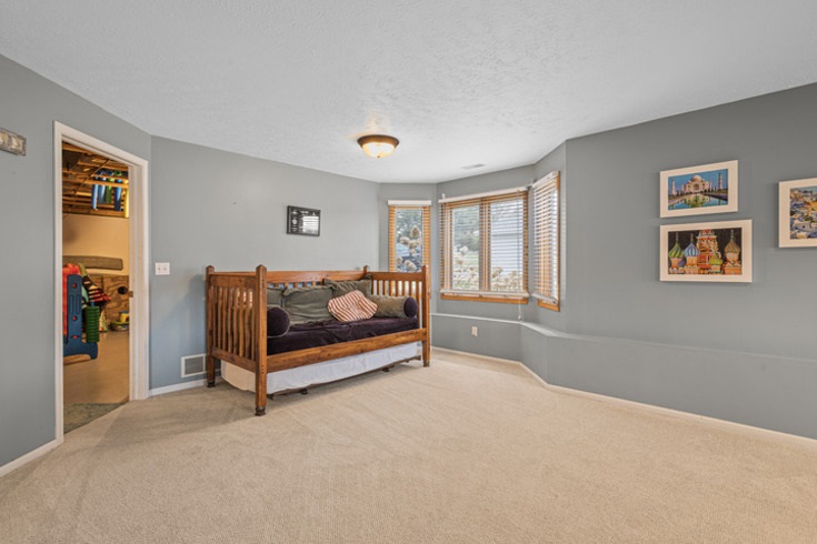 834 Breckenboro Road Lake Summerset, IL 61019 - Photo 23 of 39 a bedroom with a bed and a window