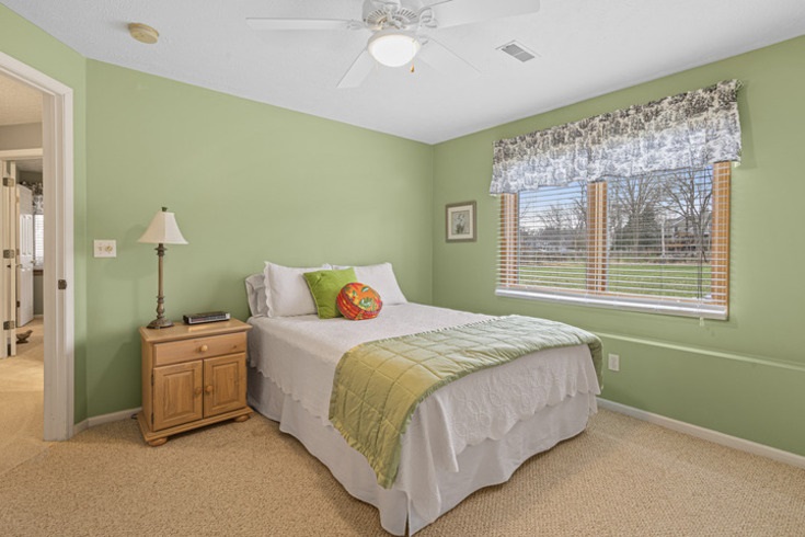 834 Breckenboro Road Lake Summerset, IL 61019 - Photo 30 of 39 a bedroom with a bed and a window