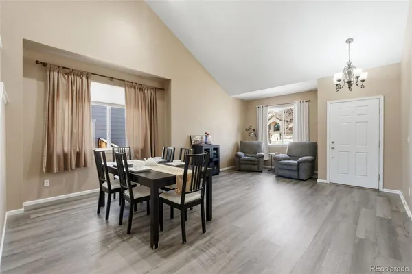 a view of a livingroom with furniture and window