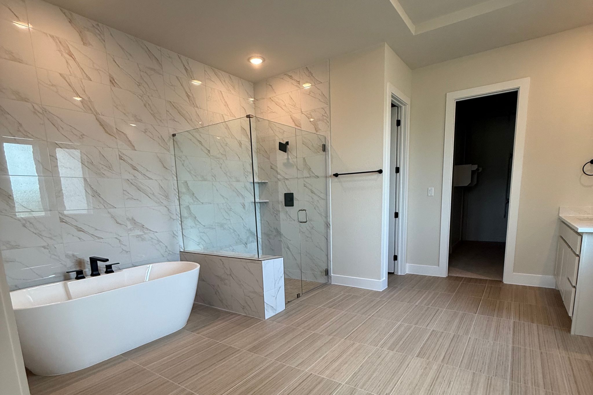 1412 Paxton Lane Georgetown, TX 78633 - Photo 8 of 14 a bathroom with a bathtub and a shower