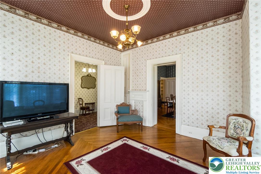 11 East Front Street Jim Thorpe, PA 18229 - Photo 12 of 63 a living room with dining room and wooden floor