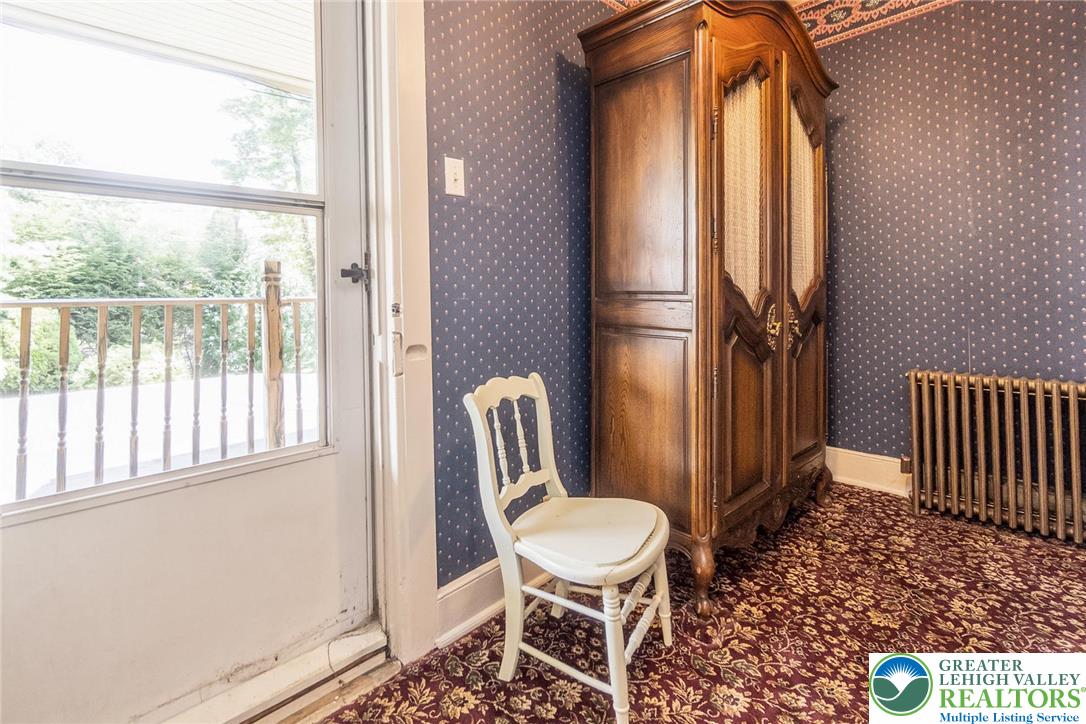 11 East Front Street Jim Thorpe, PA 18229 - Photo 37 of 63 a view of a hallway with wooden floor and chair