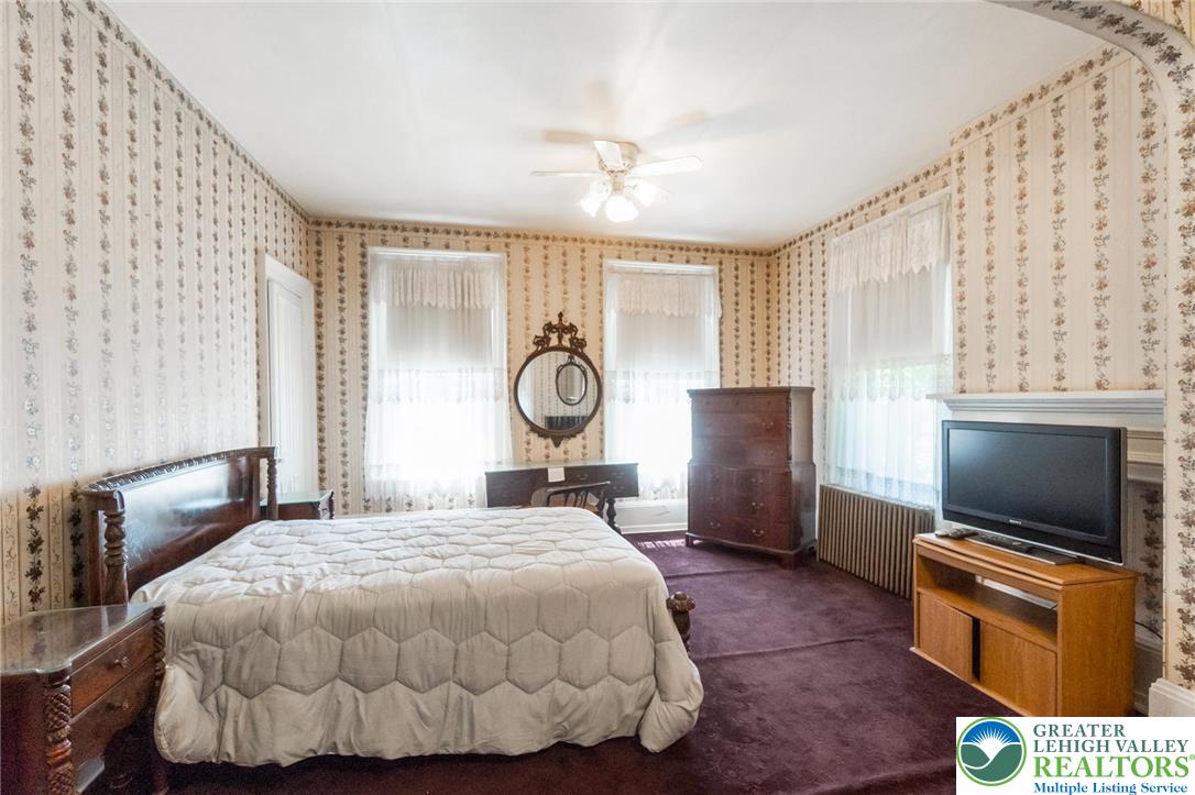 11 East Front Street Jim Thorpe, PA 18229 - Photo 47 of 63 a bedroom with a bed and flat screen tv