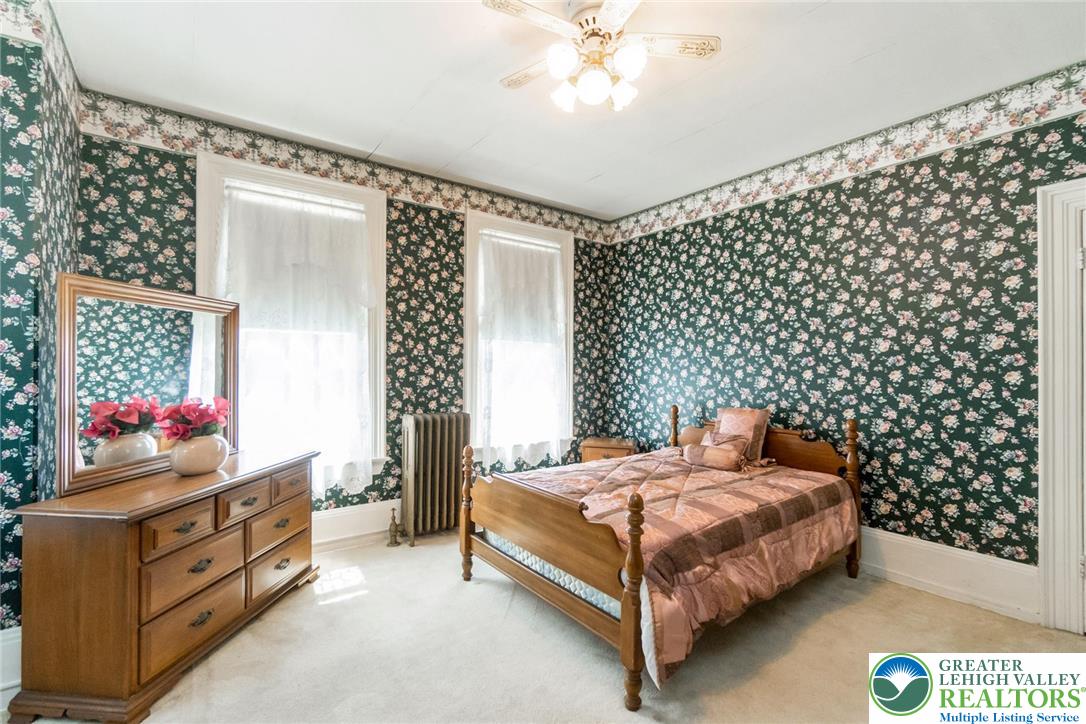 11 East Front Street Jim Thorpe, PA 18229 - Photo 52 of 63 a bedroom with a bed and a cabinets