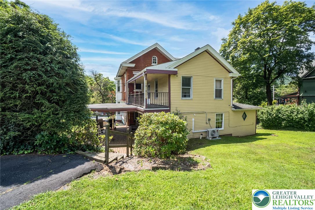 11 East Front Street Jim Thorpe, PA 18229 - Photo 6 of 63 a view of a house with a yard and sitting area