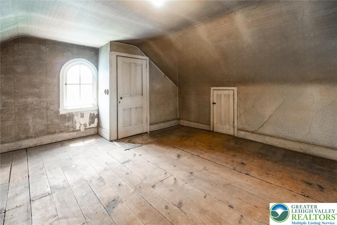 11 East Front Street Jim Thorpe, PA 18229 - Photo 62 of 63 a view of a livingroom with wooden floor and a window