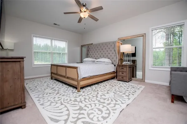 a bathroom with a sink a vanity and a mirror