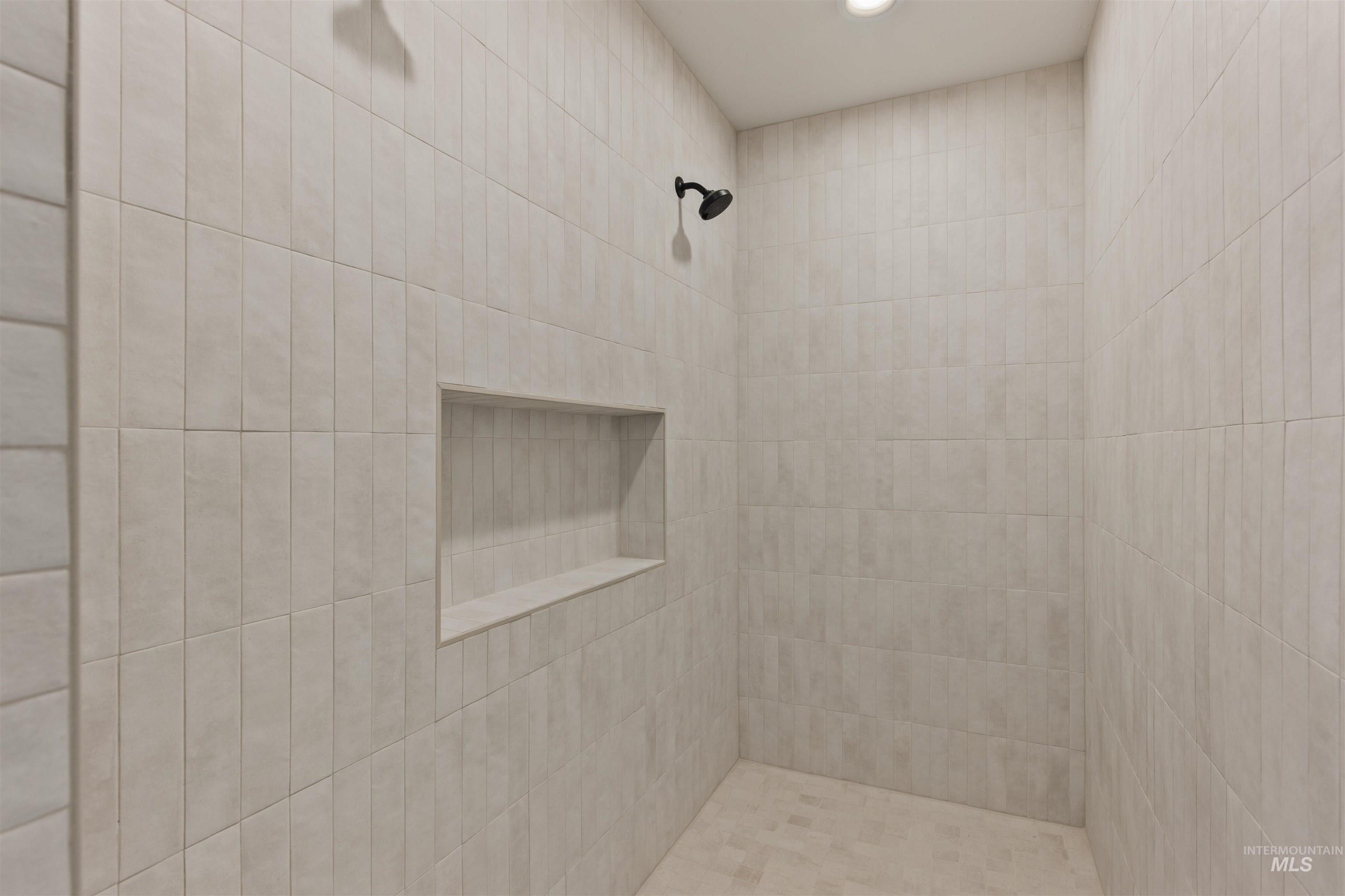 5857 South Highmark Avenue Meridian, ID 83642 - Photo 20 of 37 Full bath with tiled shower and recessed lighting