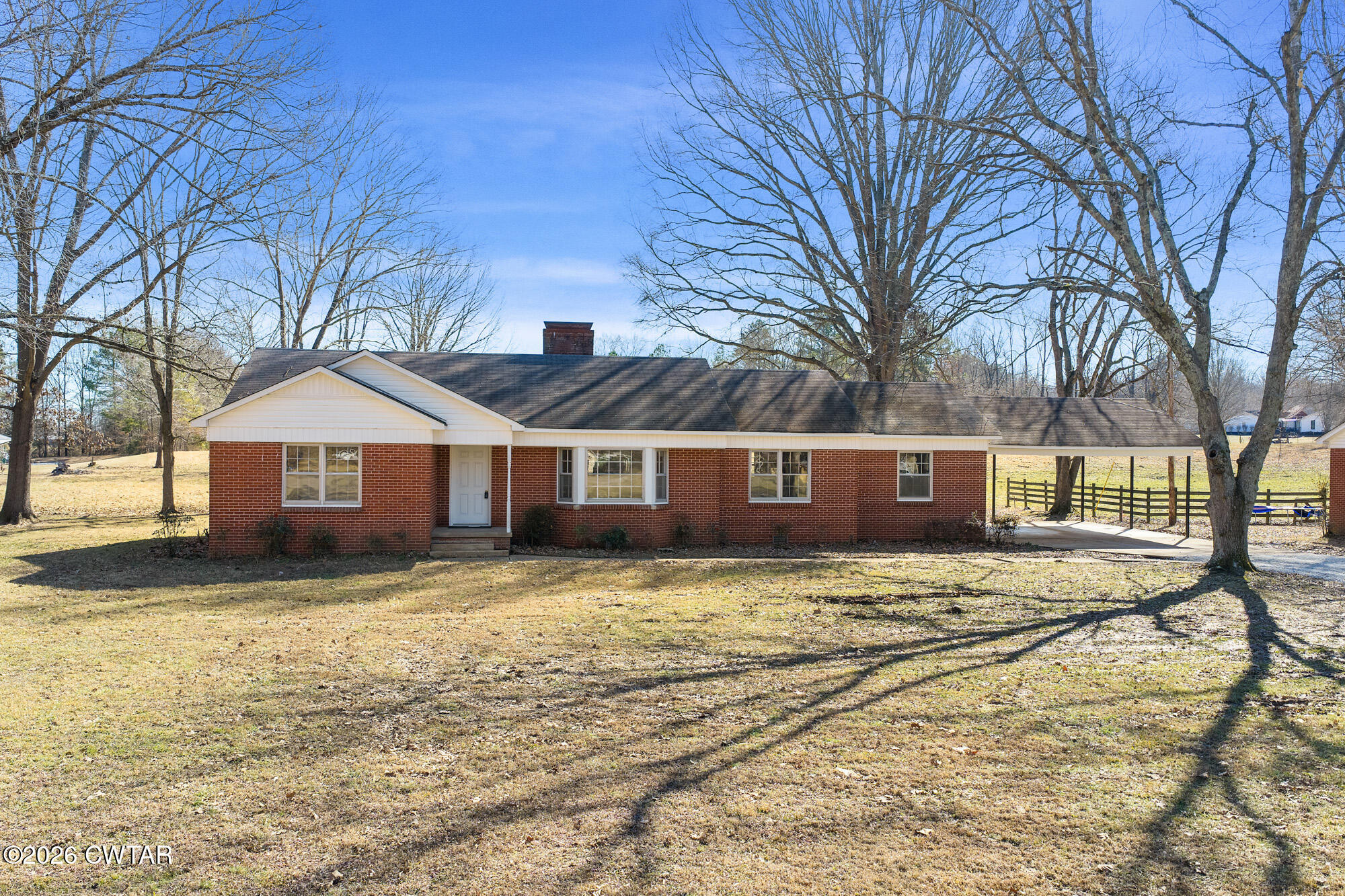 18810 West Main Street Huntingdon, TN 38344 - Photo 1 of 34 a view of a house with a yard