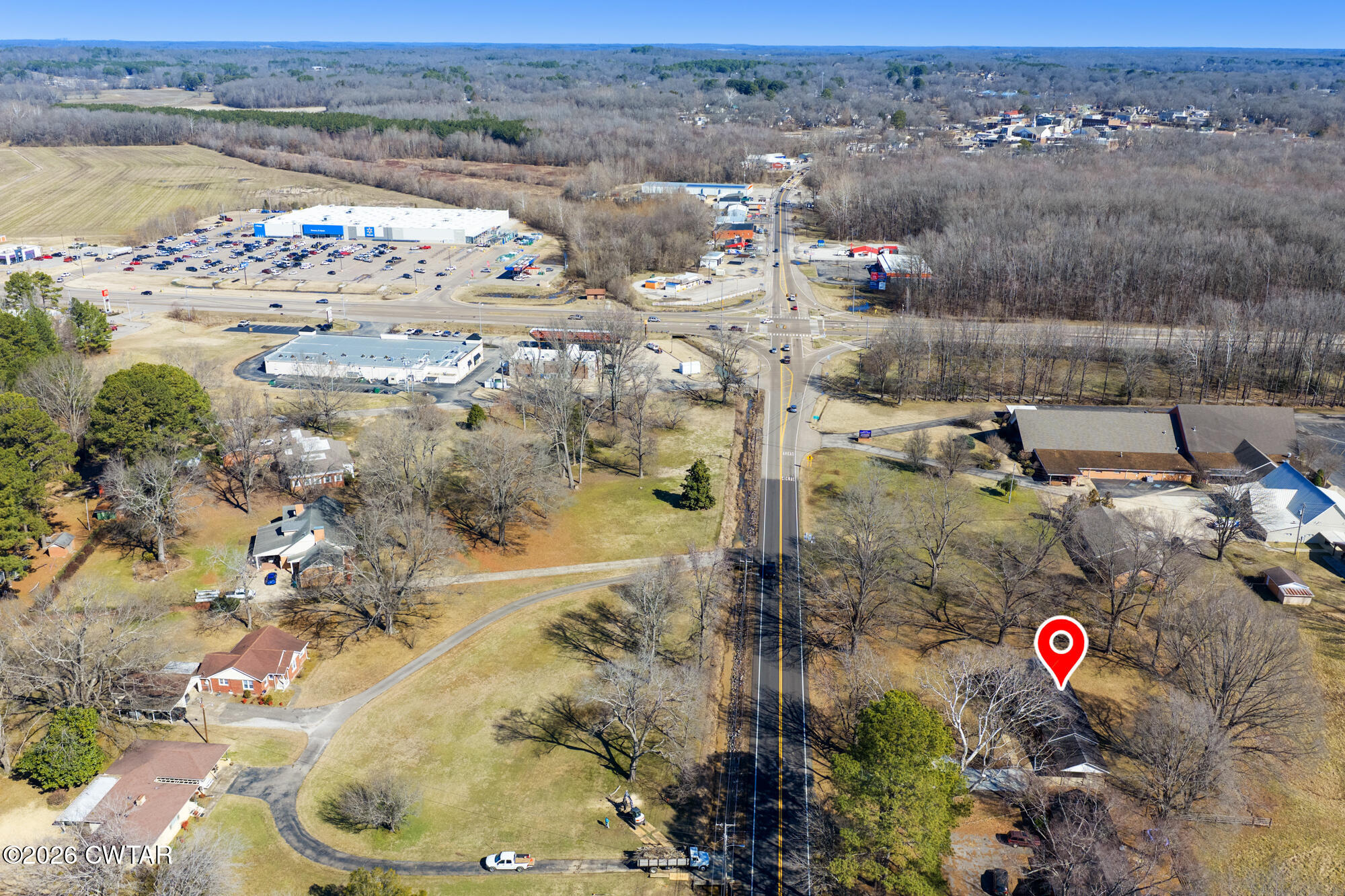 18810 West Main Street Huntingdon, TN 38344 - Photo 25 of 34 an aerial view of residential houses with outdoor space