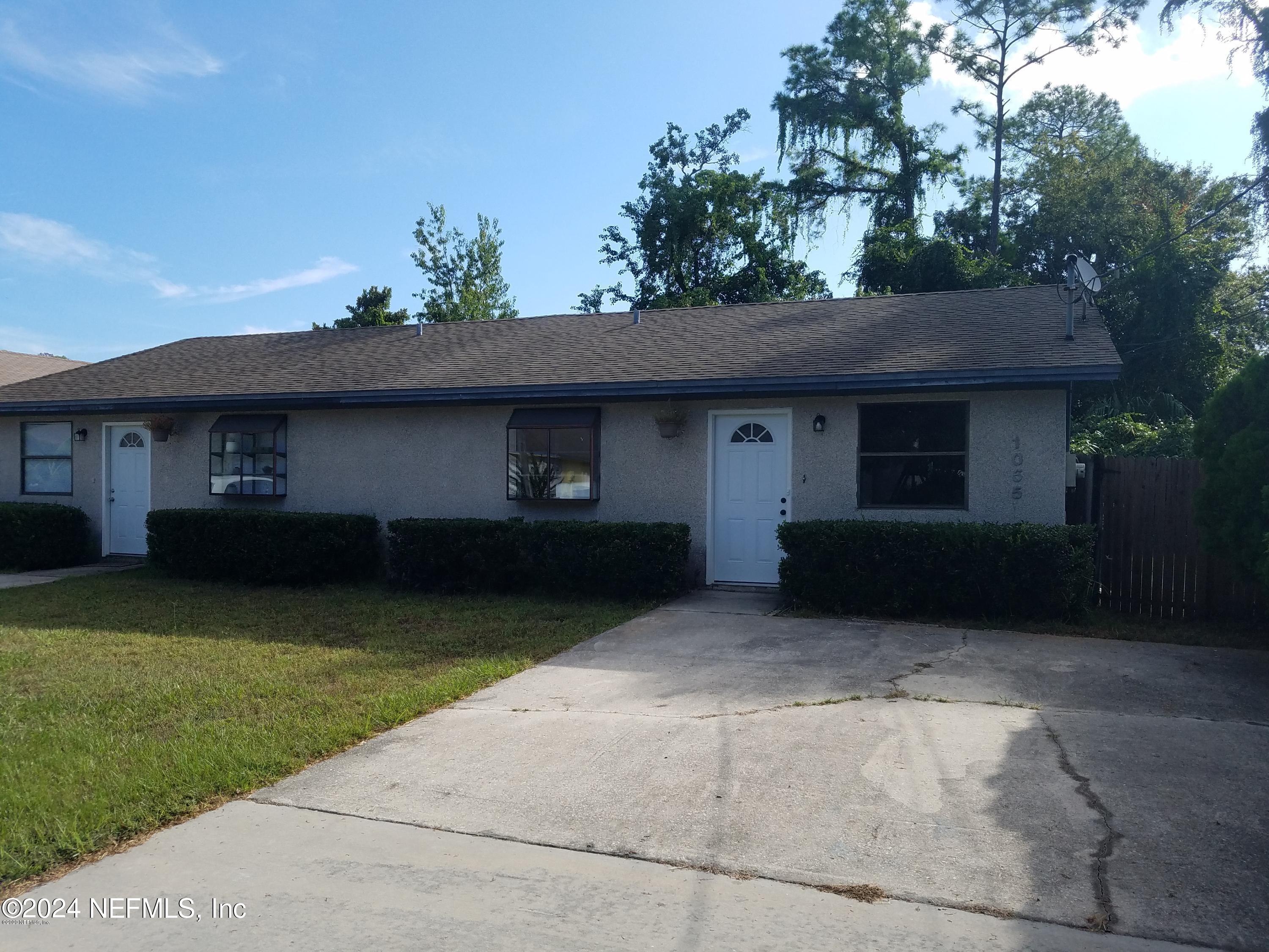 1055 Stocks Street Atlantic Beach, FL 32233 - Photo 1 of 15 a front view of house with yard