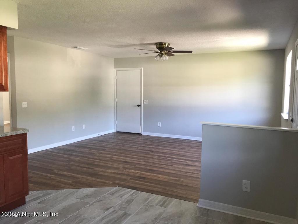 1055 Stocks Street Atlantic Beach, FL 32233 - Photo 8 of 15 wooden floor in an empty room