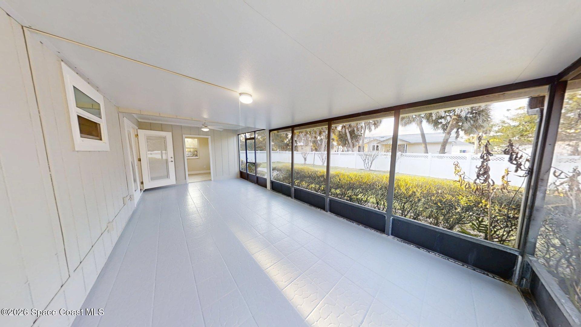137 Concha Drive Sebastian, FL 32958 - Photo 23 of 29 a view of an entryway with wooden floor