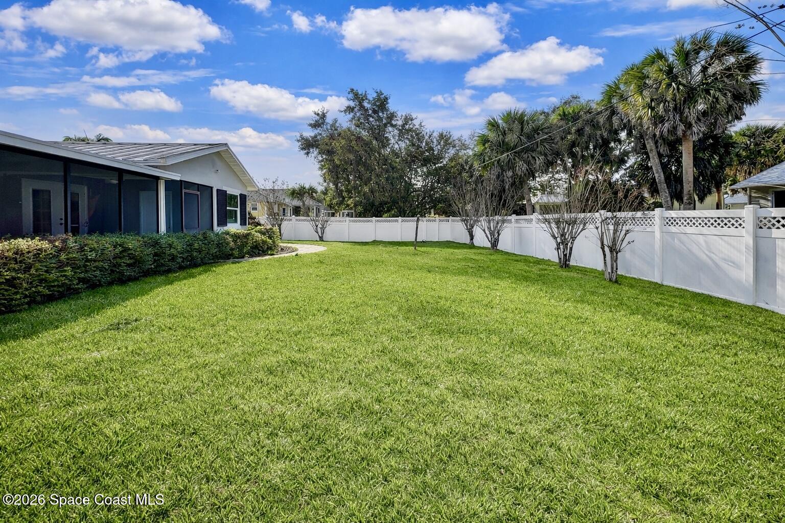 137 Concha Drive Sebastian, FL 32958 - Photo 26 of 29 a house view with a garden space