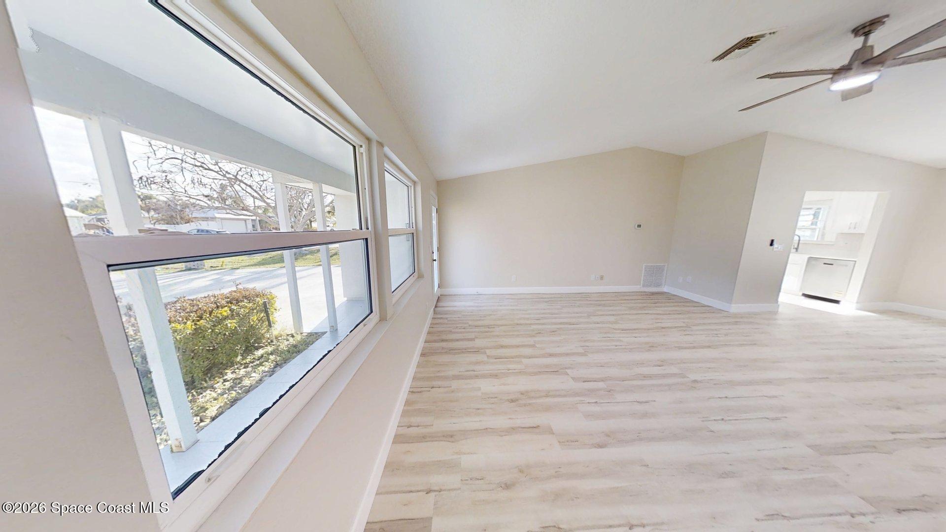 137 Concha Drive Sebastian, FL 32958 - Photo 5 of 29 a view of an empty room and window