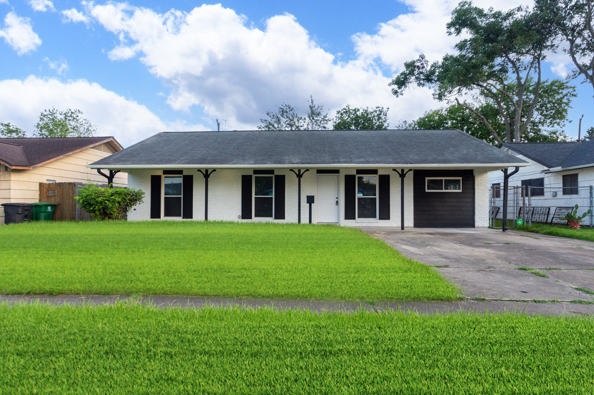 front view of a house and a yard