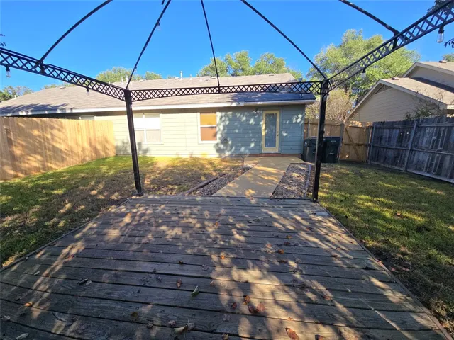 a view of a house with a park