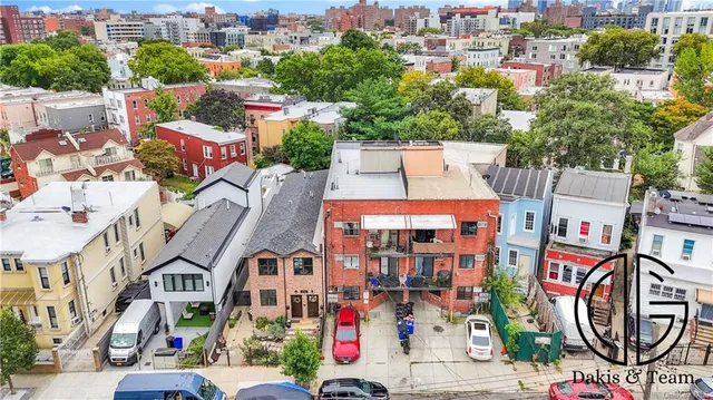 an aerial view of multi story residential apartment building