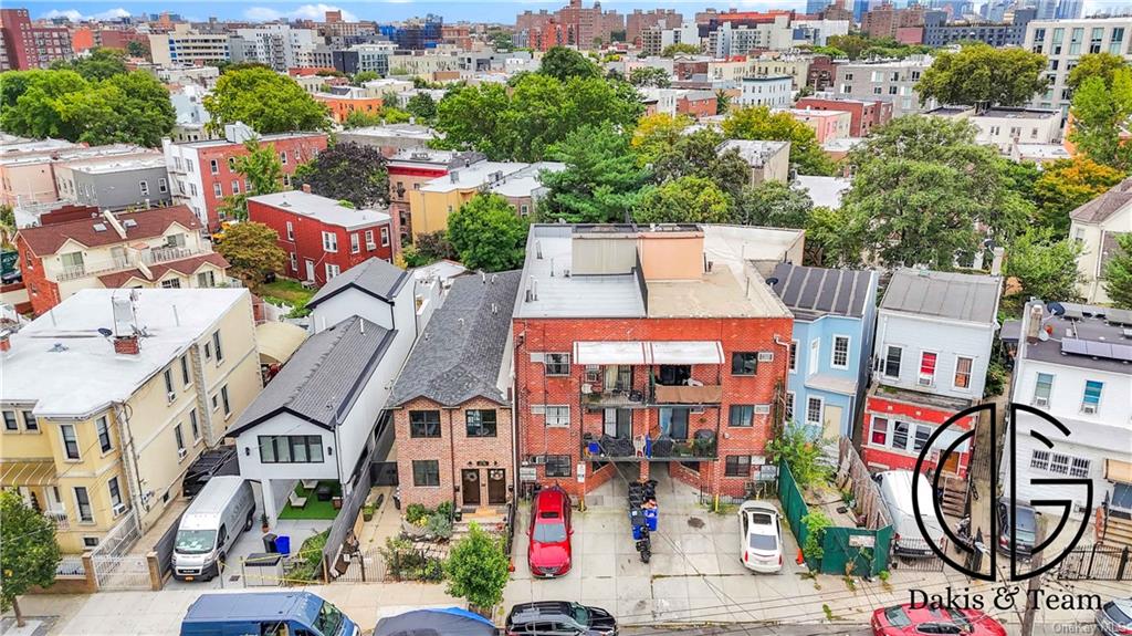 11-46 Welling Court Queens, NY 11102 - Photo 8 of 9 an aerial view of multi story residential apartment building