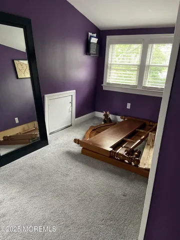 a car parked in a room next to a window