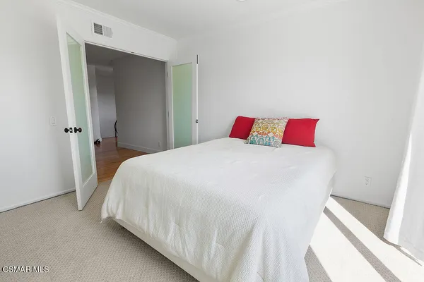 a view of balcony with furniture