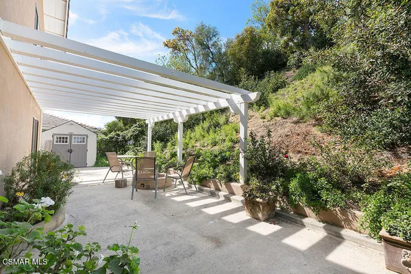 a aerial view of a house with a yard