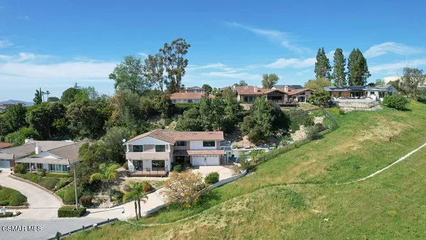 a view of an ocean in the sunset