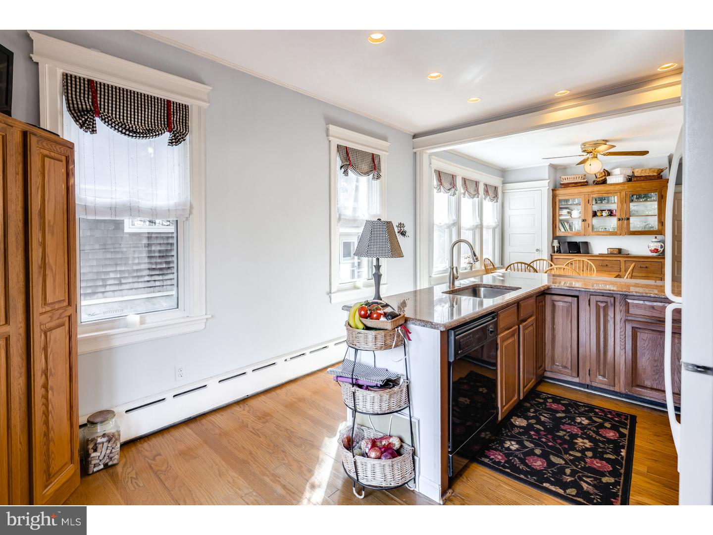 127 Lafayette Avenue Haddonfield, NJ 08033 - Photo 11 of 25 a kitchen with stainless steel appliances granite countertop a stove a sink and a refrigerator