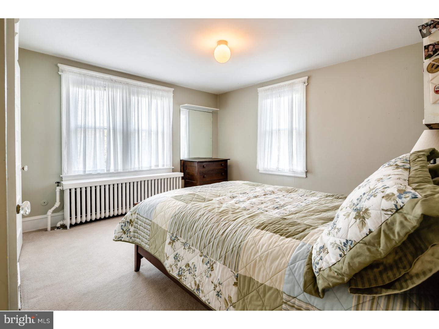 127 Lafayette Avenue Haddonfield, NJ 08033 - Photo 19 of 25 a bedroom with a bed and a window